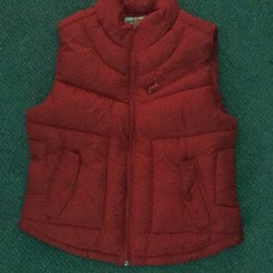 A red 100% polyester lining and filling vest